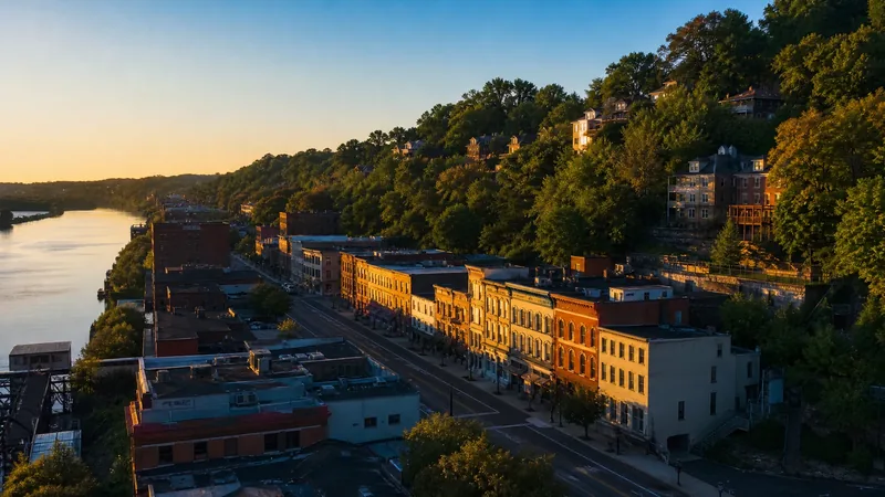 Hillside river-city commercial street at golden hour, Cincinnati Business License